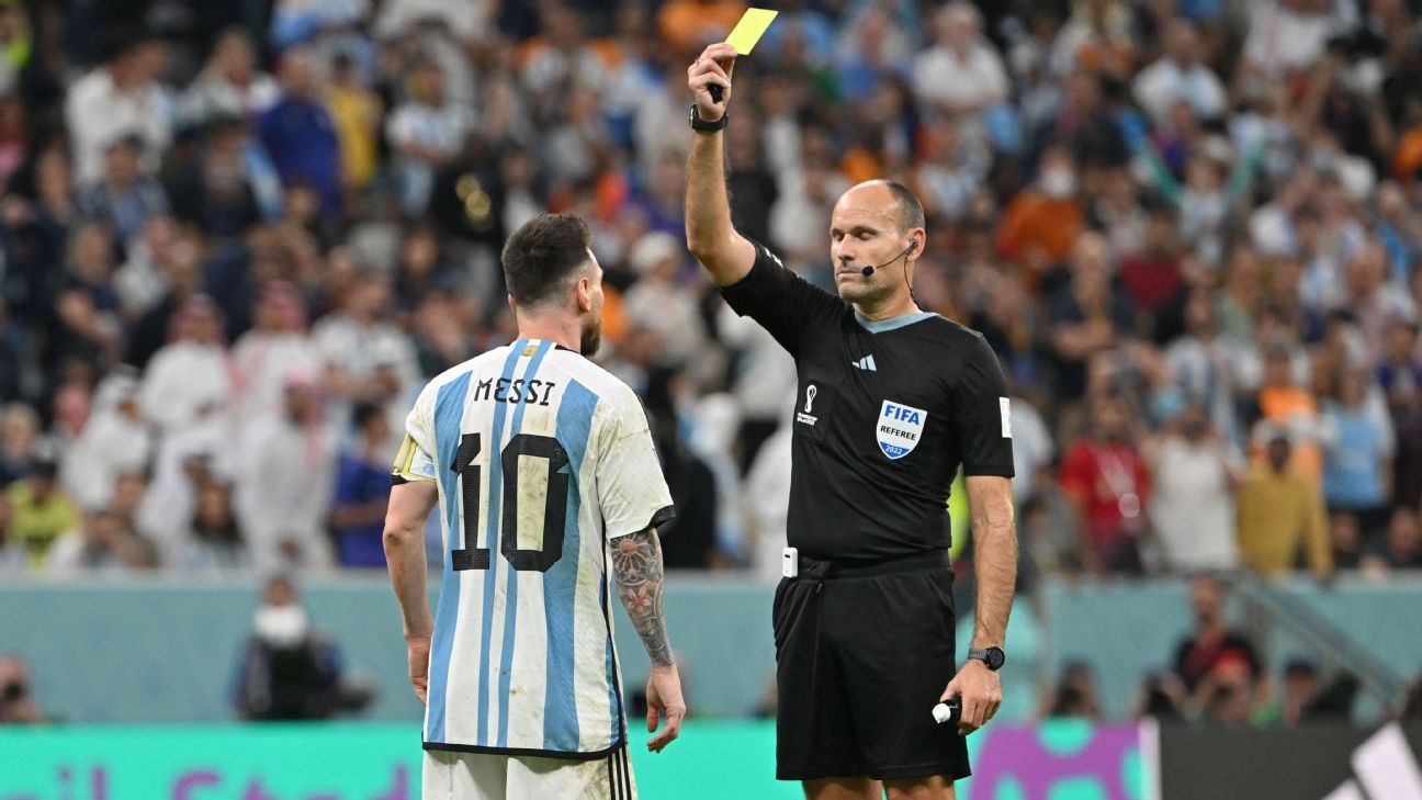 Argentina's players contest with the official after he issued yet another caution to Argentina