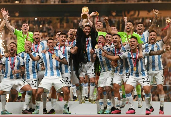 Lionel Messi lifts the World Cup trophy as he and Argentina celebrate their win on Dec. 18, 2022.